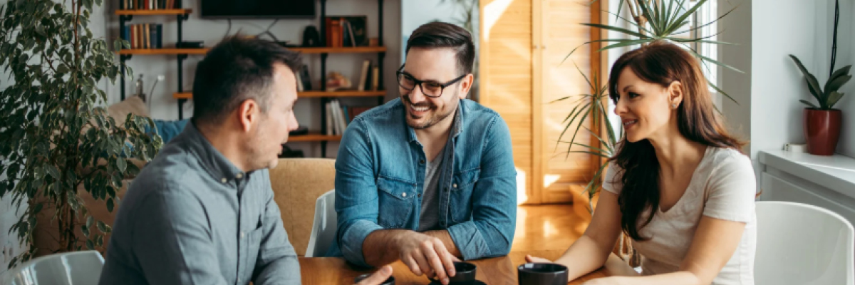 People sitting around a table talking